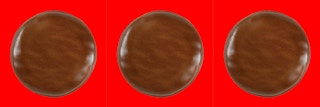 Three Girl Scout Tagalong cookies on a red background