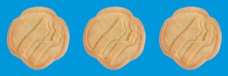 Three Girl Scout Trefoils cookies on a blue background