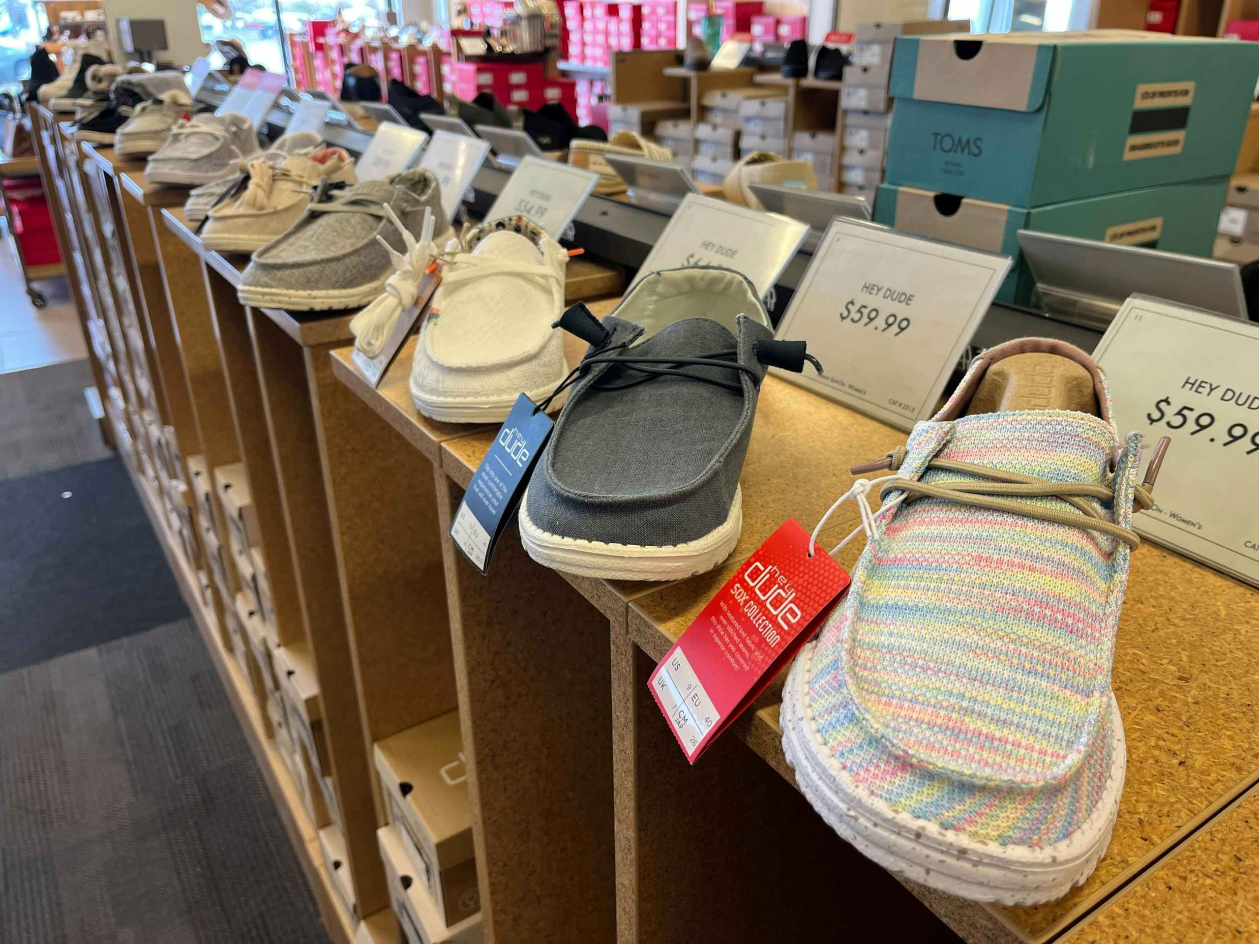 hey dude shoes on a shelf