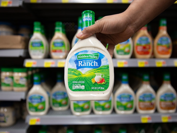 Hand holding Hidden Valley Ranch dressing inside a Walmart
