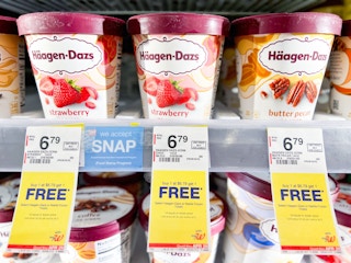 ice cream on shelf above sales tags