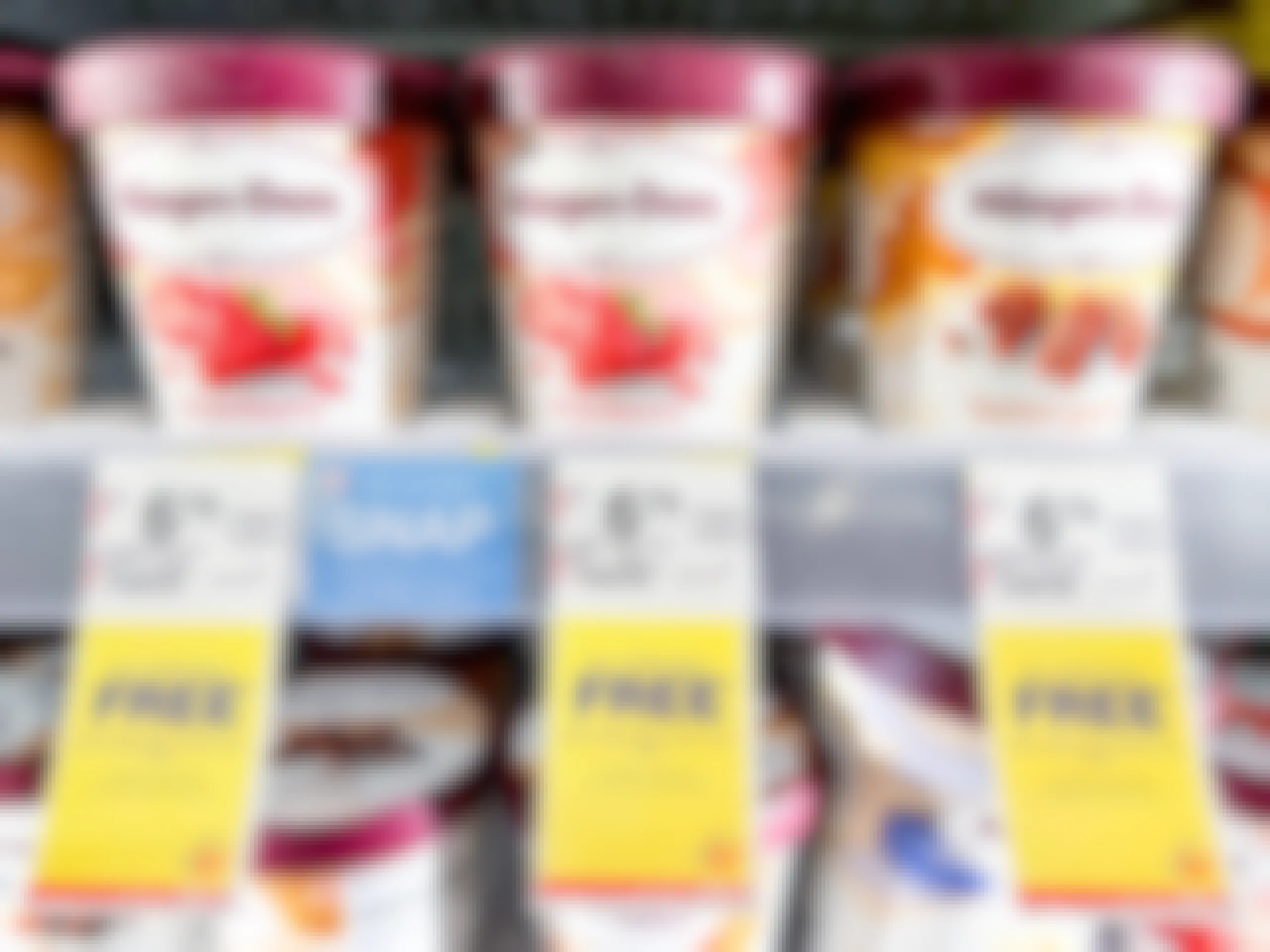 ice cream on shelf above sales tags