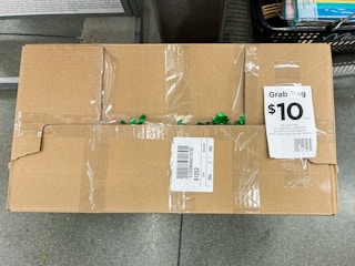 cardboard box labeled "$10 grab bag" in stores at michaels