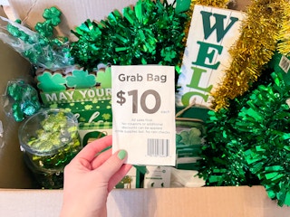 hand holding $10 grab bag price tag