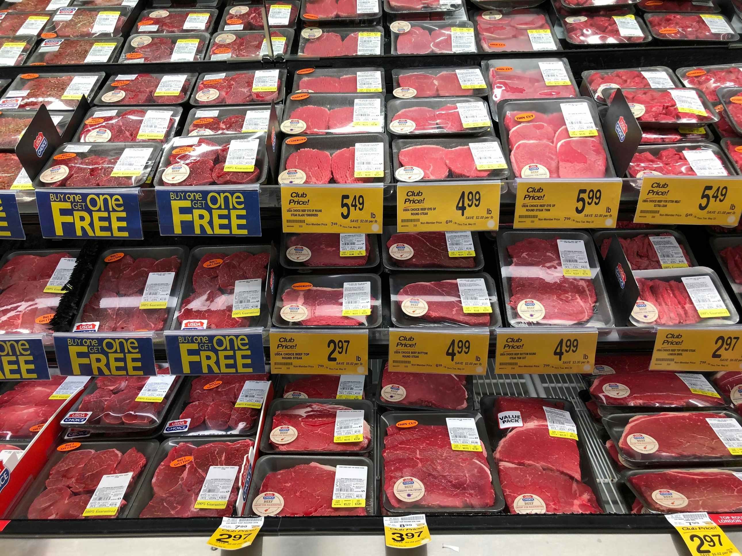 A photo showing some selections of good cuts of beef meat packed neatly in plastic trays, ready for cooking.