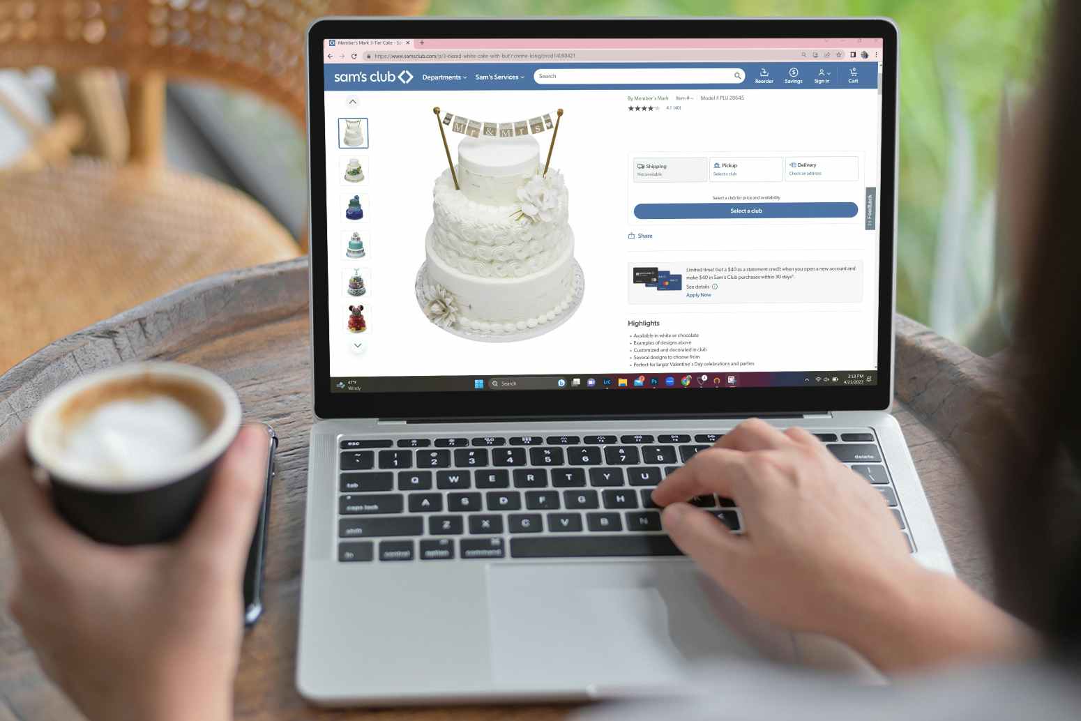a person looking at a wedding cake on sams clubs website on a laptop 