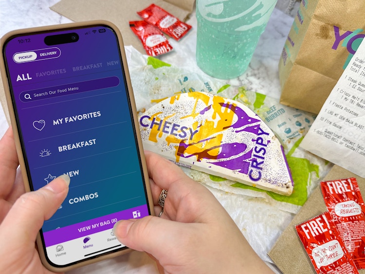 Someone looking at the menu in the Taco Bell app