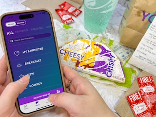 Someone looking at the menu in the Taco Bell app
