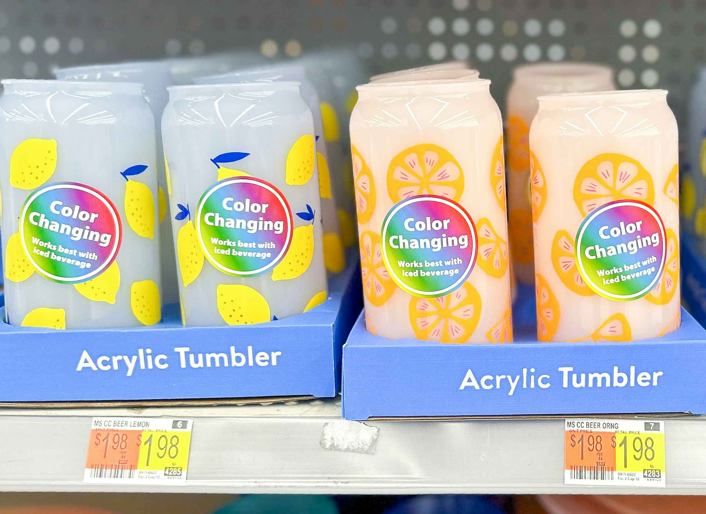 Color changing can tumblers in blue and orange on the shelf at Walmart