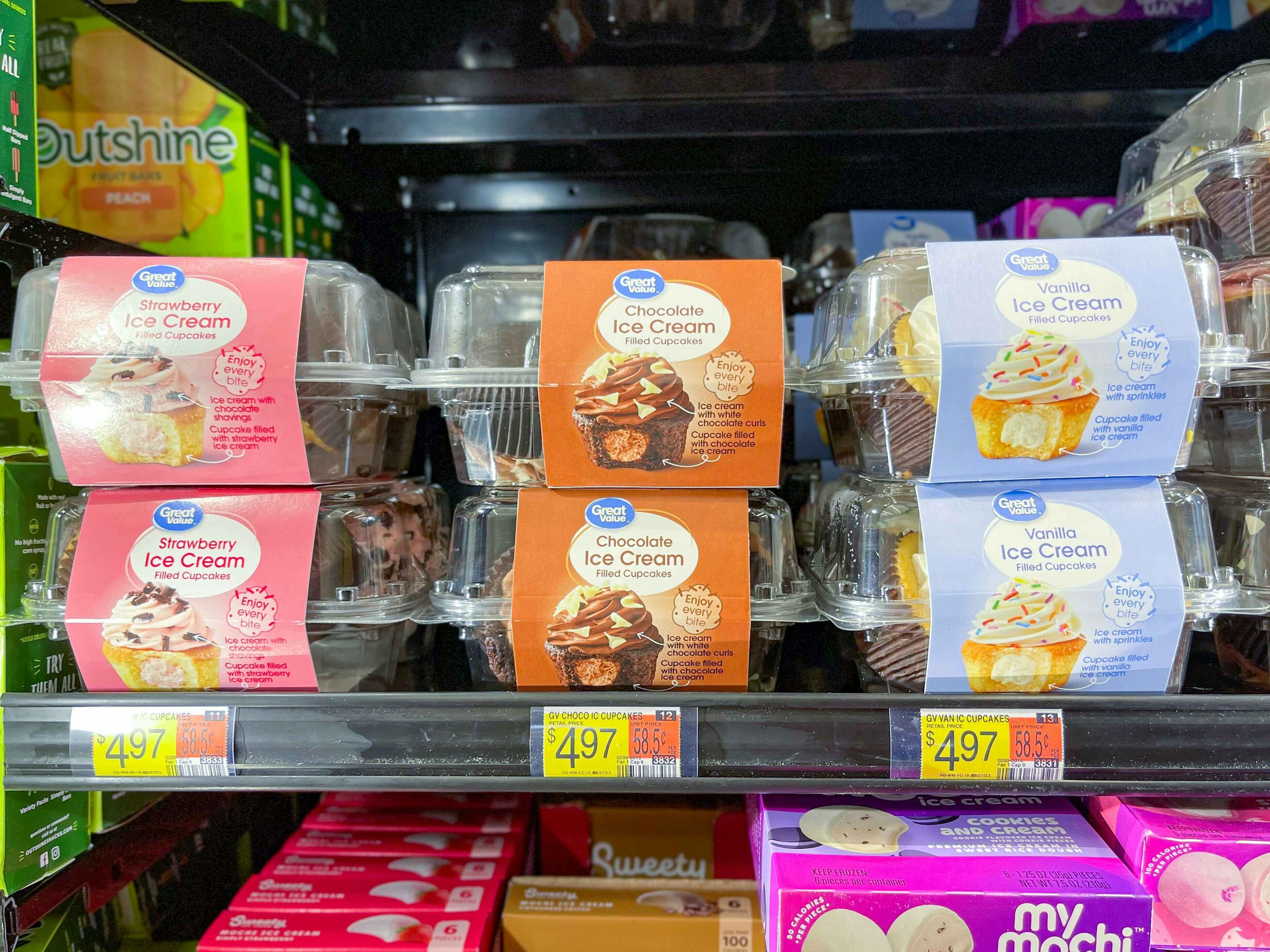 Packs of Great Value Vanilla, Chocolate, and Strawberry Ice Cream Filled Cupcakes in the freezer at Walmart