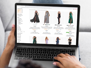 a person looking at amazon on their macbook for prom dresses