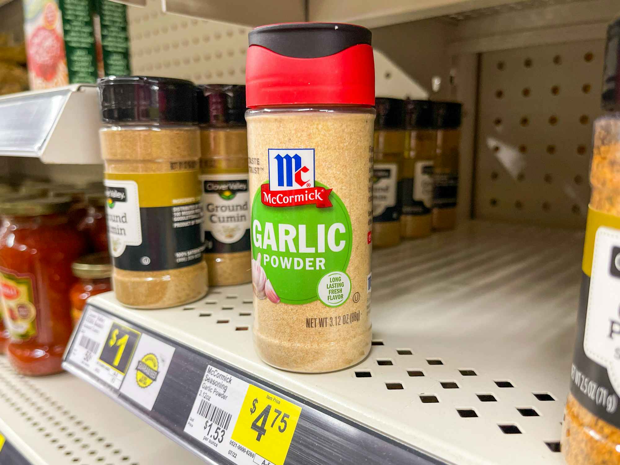 McCormick garlic powder on a shelf at Dollar General