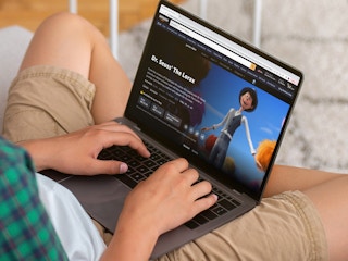 a person looking at the lorax on amazon prime video on their macbook