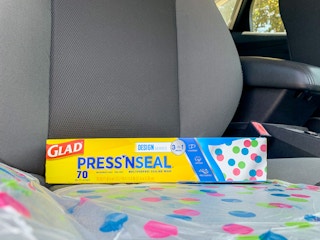 GLAD wrap on a car seat