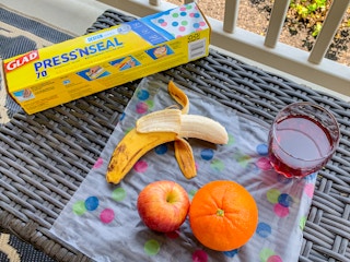 fruit sitting on top of a GLAD disposable placemat