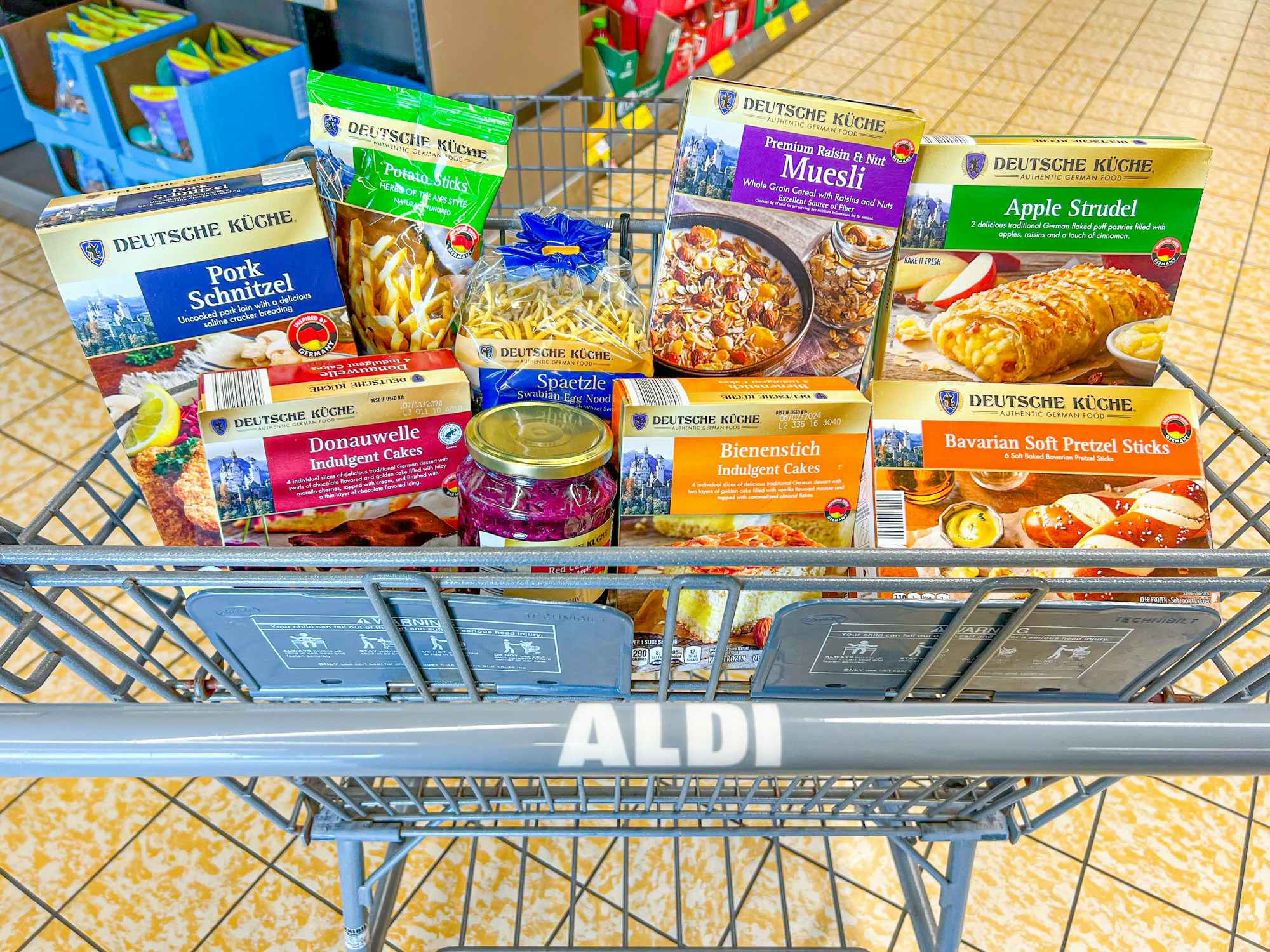 An Aldi cart filled with German Week foods