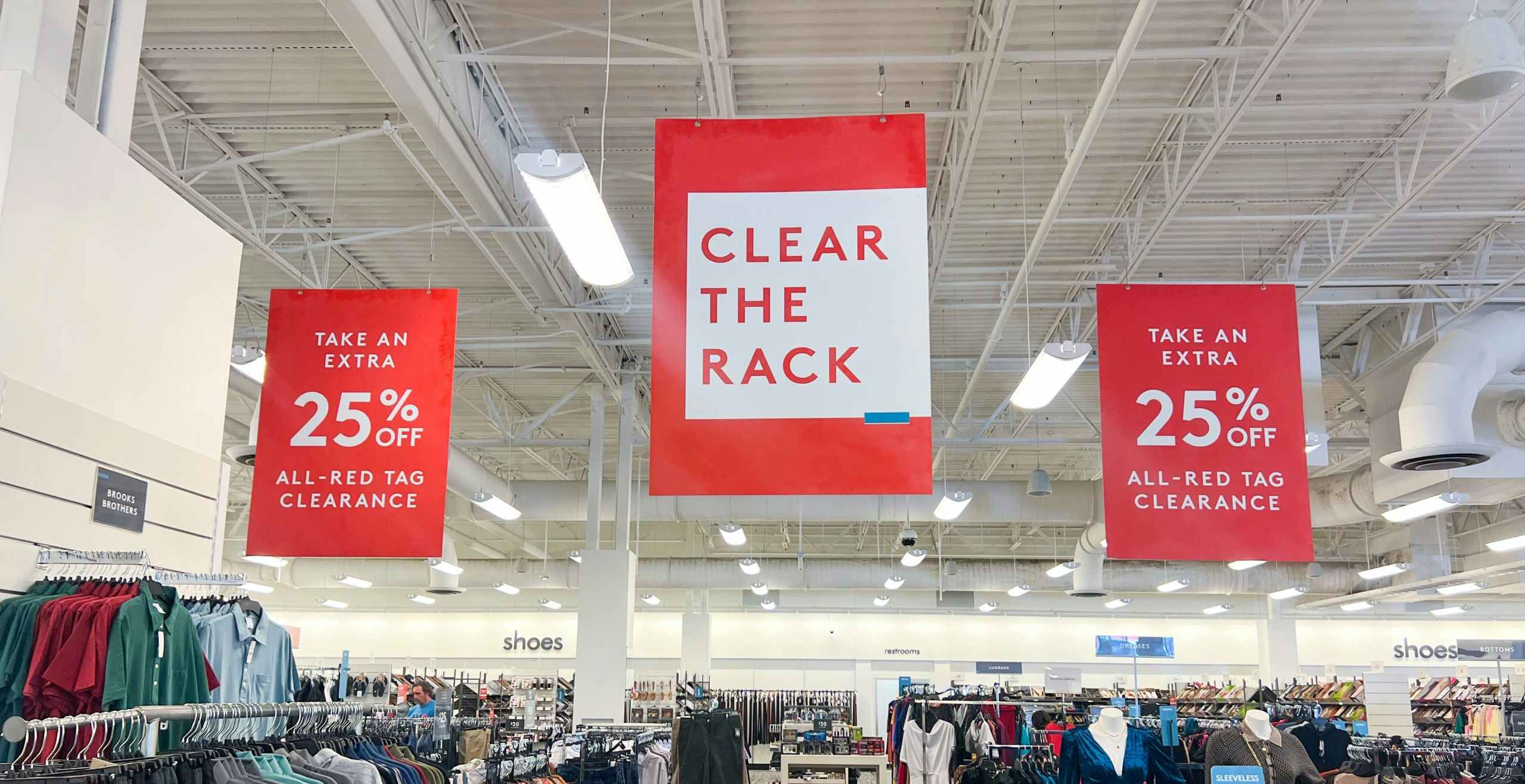 nordstrom rack with signs about the clear the rack event