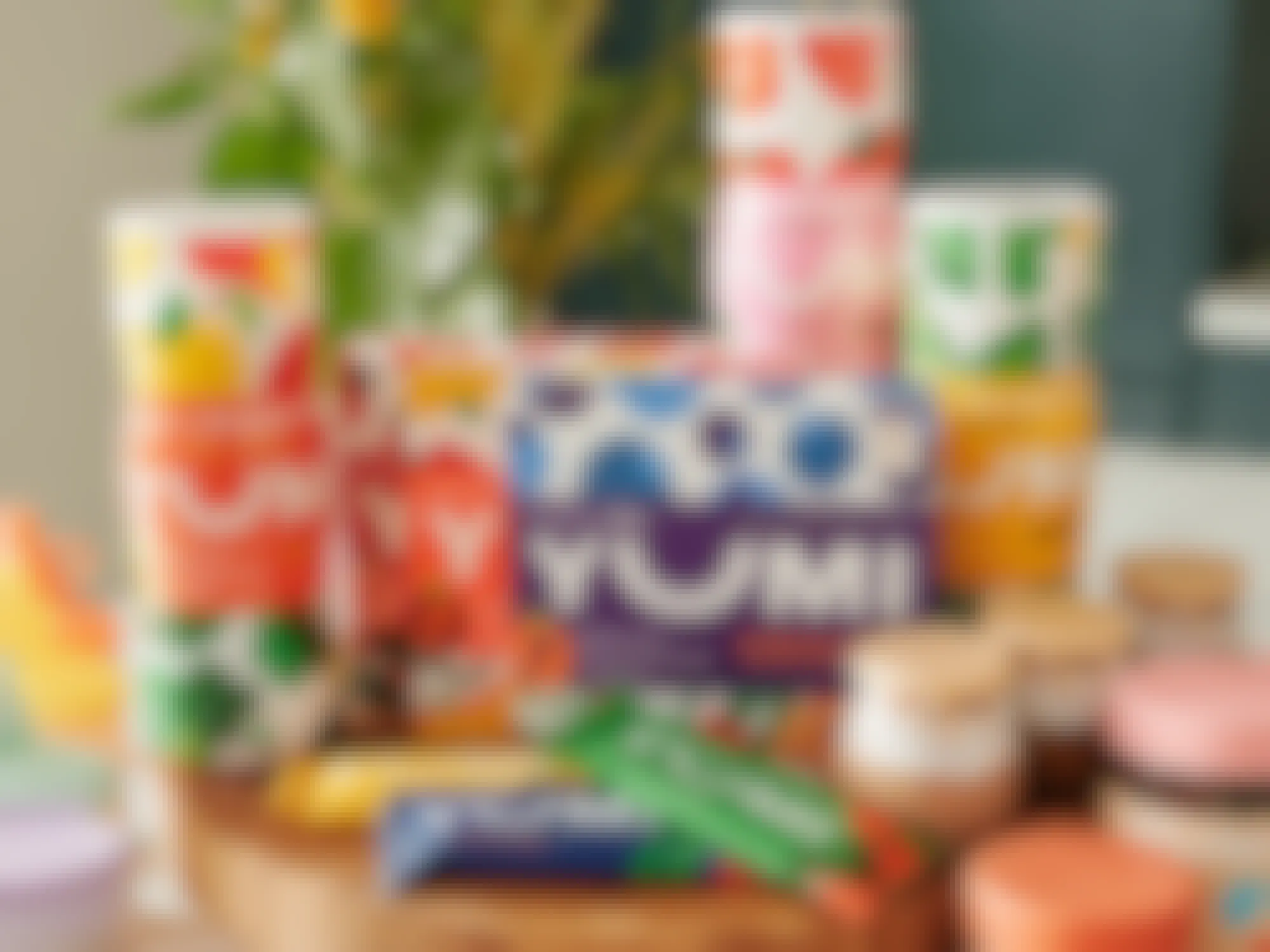 yumi baby food products sitting on a table