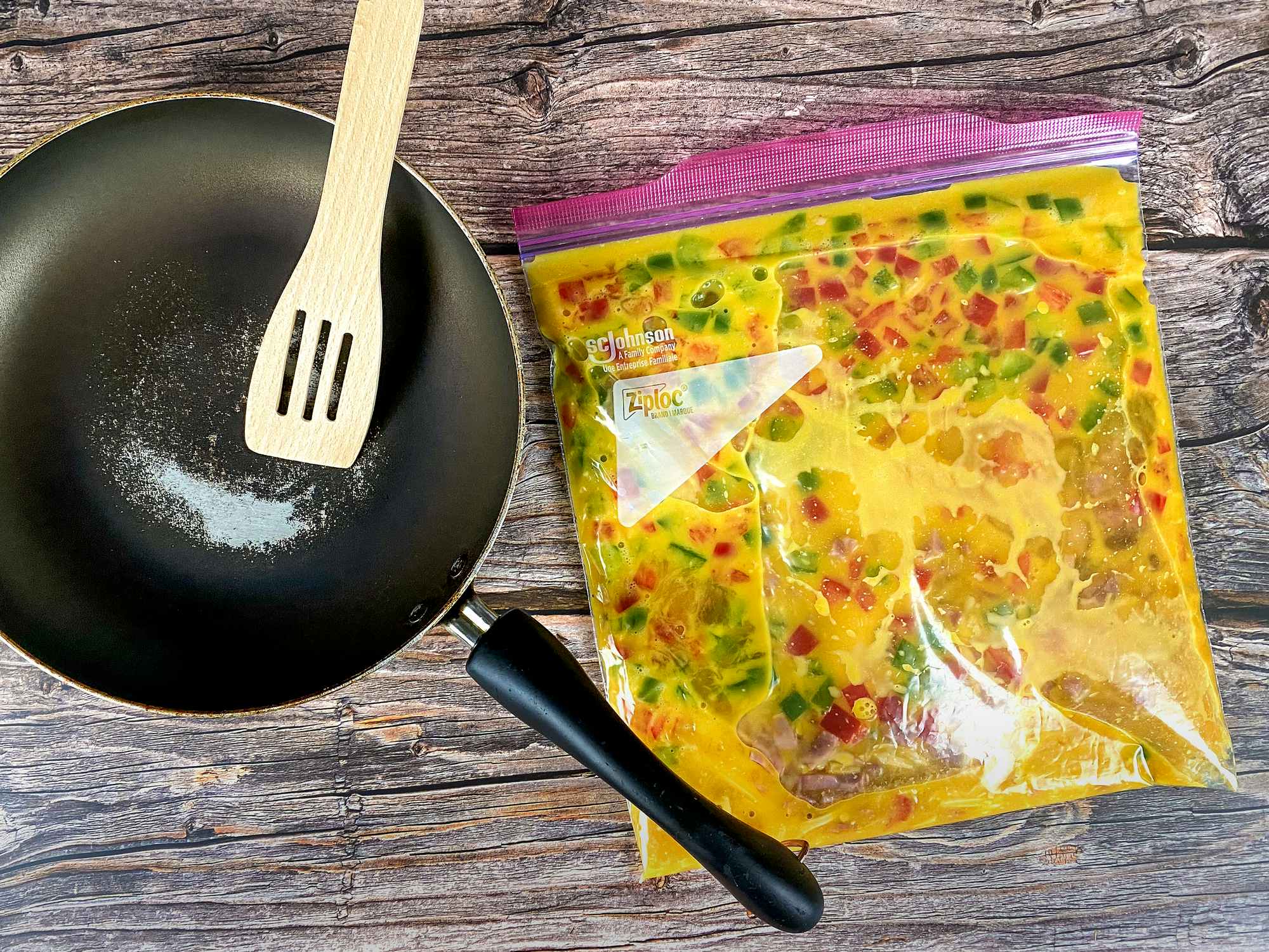 bag of eggs and omelet, pan, and spatula