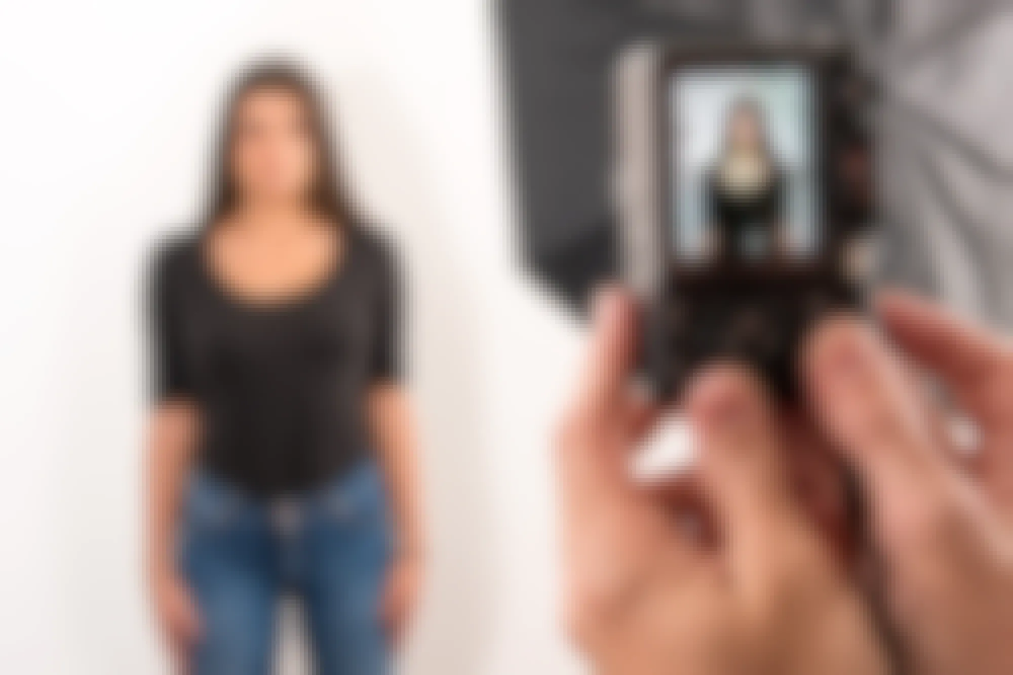 Someone posing for a passport photo in a studio