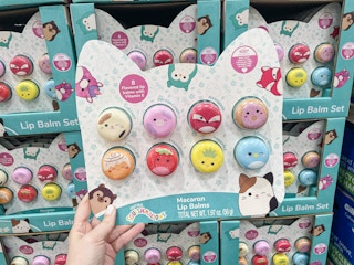 hand holding a pack of squishmallows lip balm