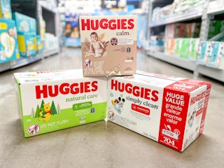threee boxes of huggies wipes stacked in store