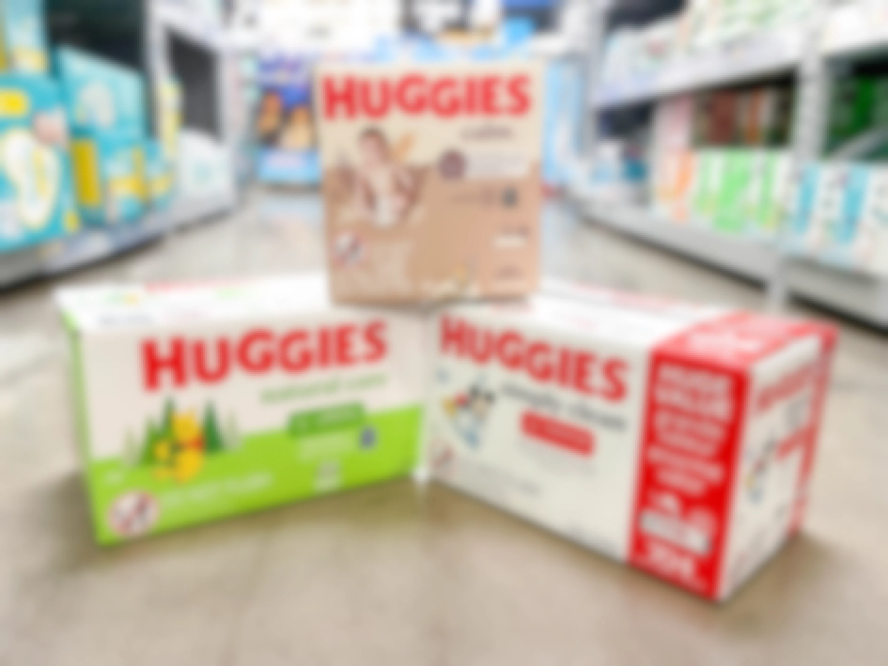 threee boxes of huggies wipes stacked in store