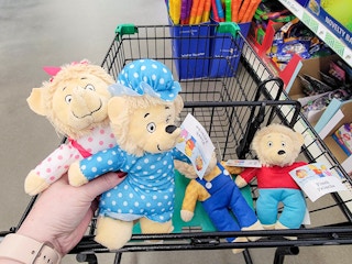 bernstain bear plushes in a cart