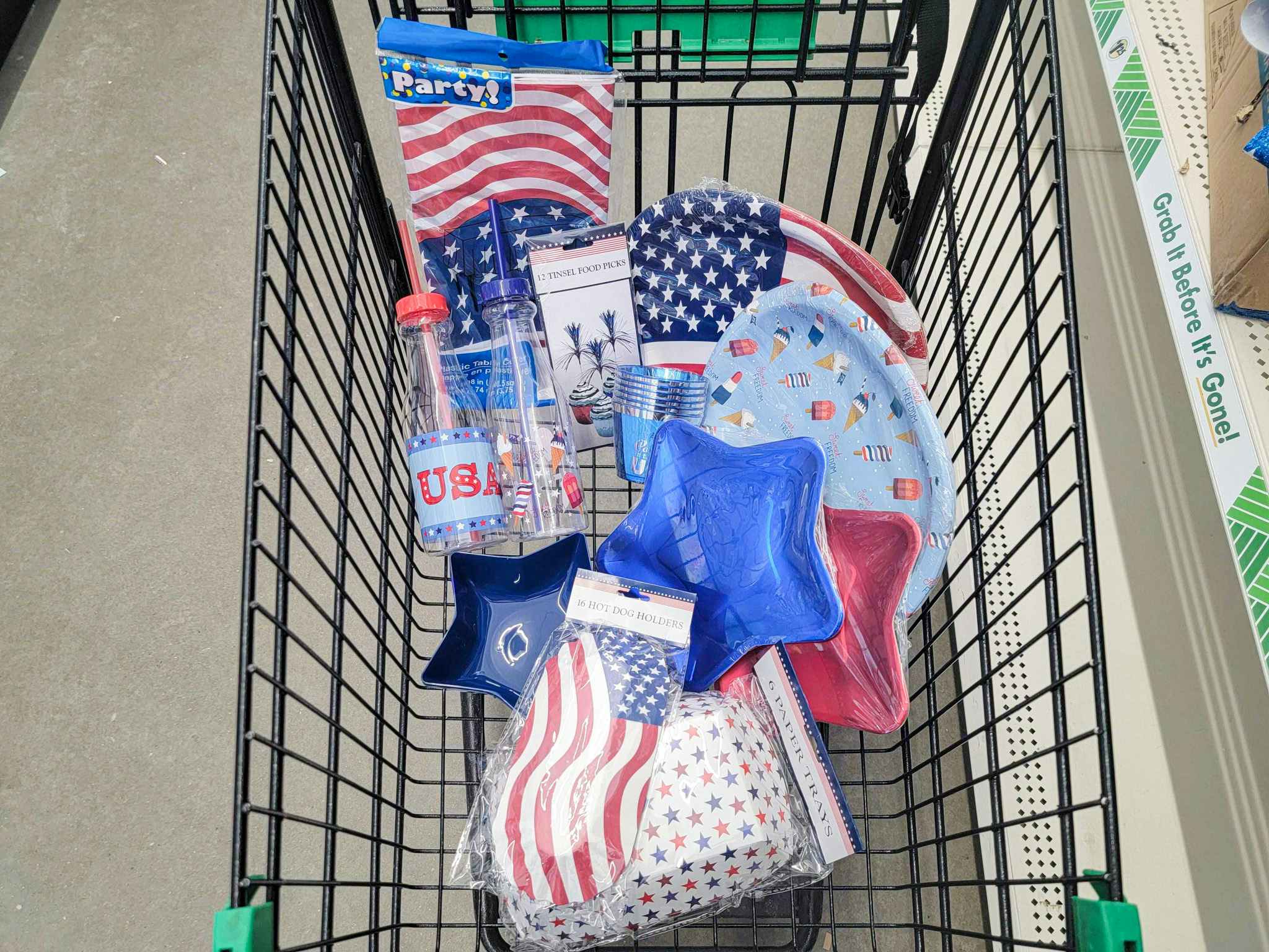 patriotic party supplies in a cart