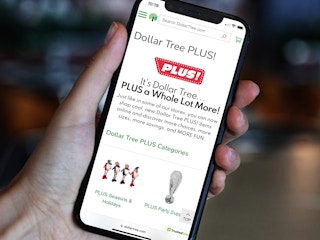 a person looking at dollar tree plus online on their iphone