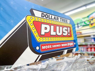 Dollar Tree Plus signage on a fixture inside Dollar Tree