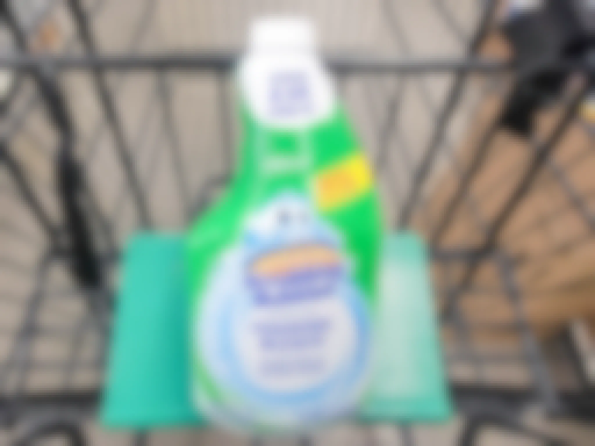 bottle of scrubbing bubbles foaming bleach in a cart