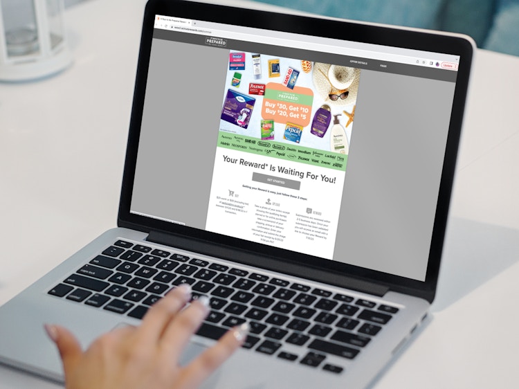 a person looking at the johnson & johnson rebate directions page on a macbook