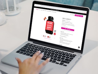 a person looking at the HUM nutrition website on their macbook