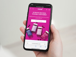 a person looking at the HUM online quiz on their iphone