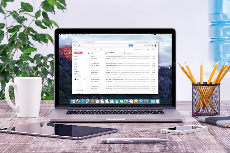 A Macbook laptop displays Google Gmail
