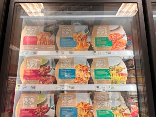 Different flavors of Home Bake meals in a store fridge