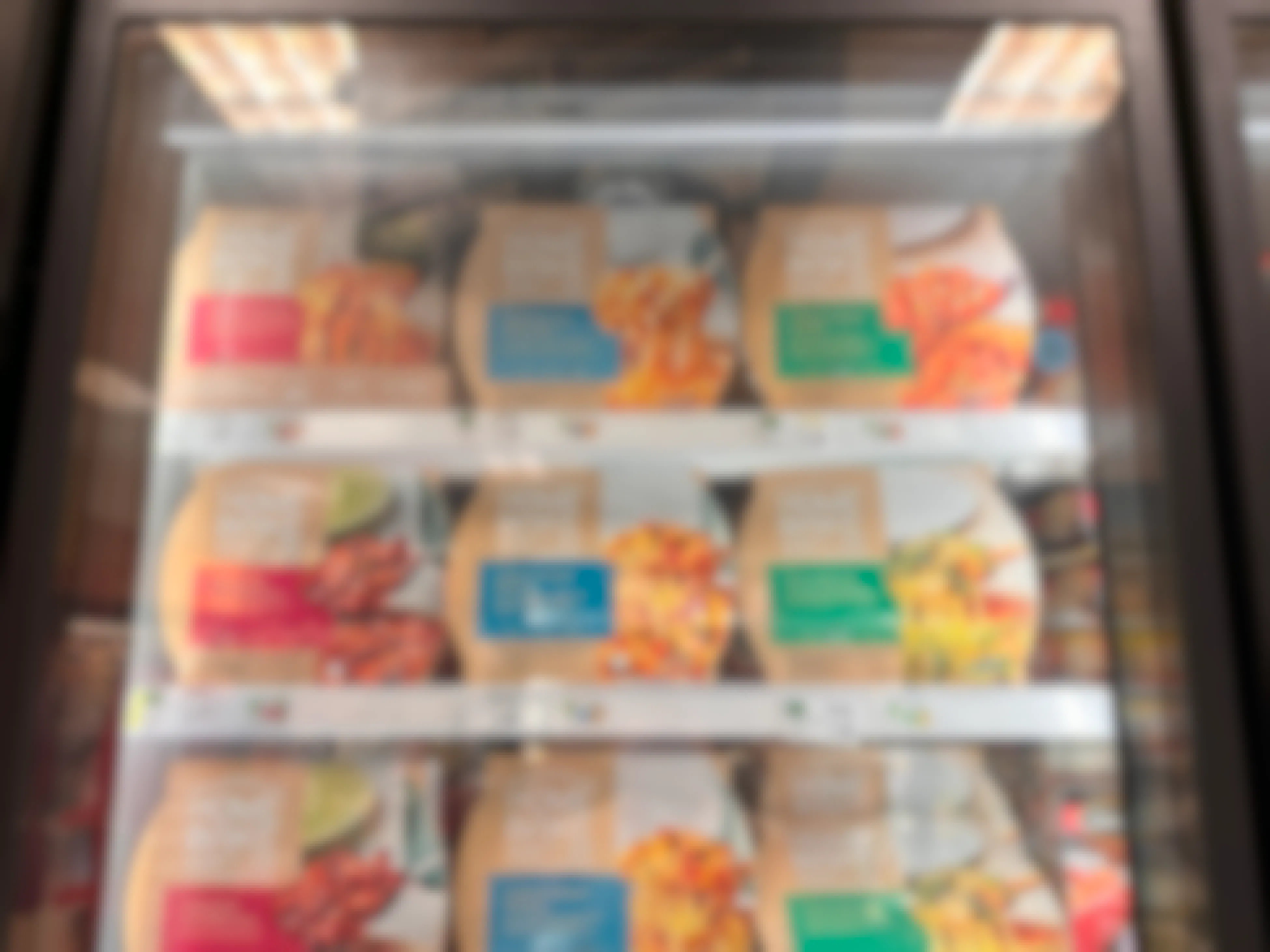 Different flavors of Home Bake meals in a store fridge