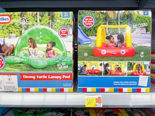 A variety of Little Tikes pools sitting on a store shelf.