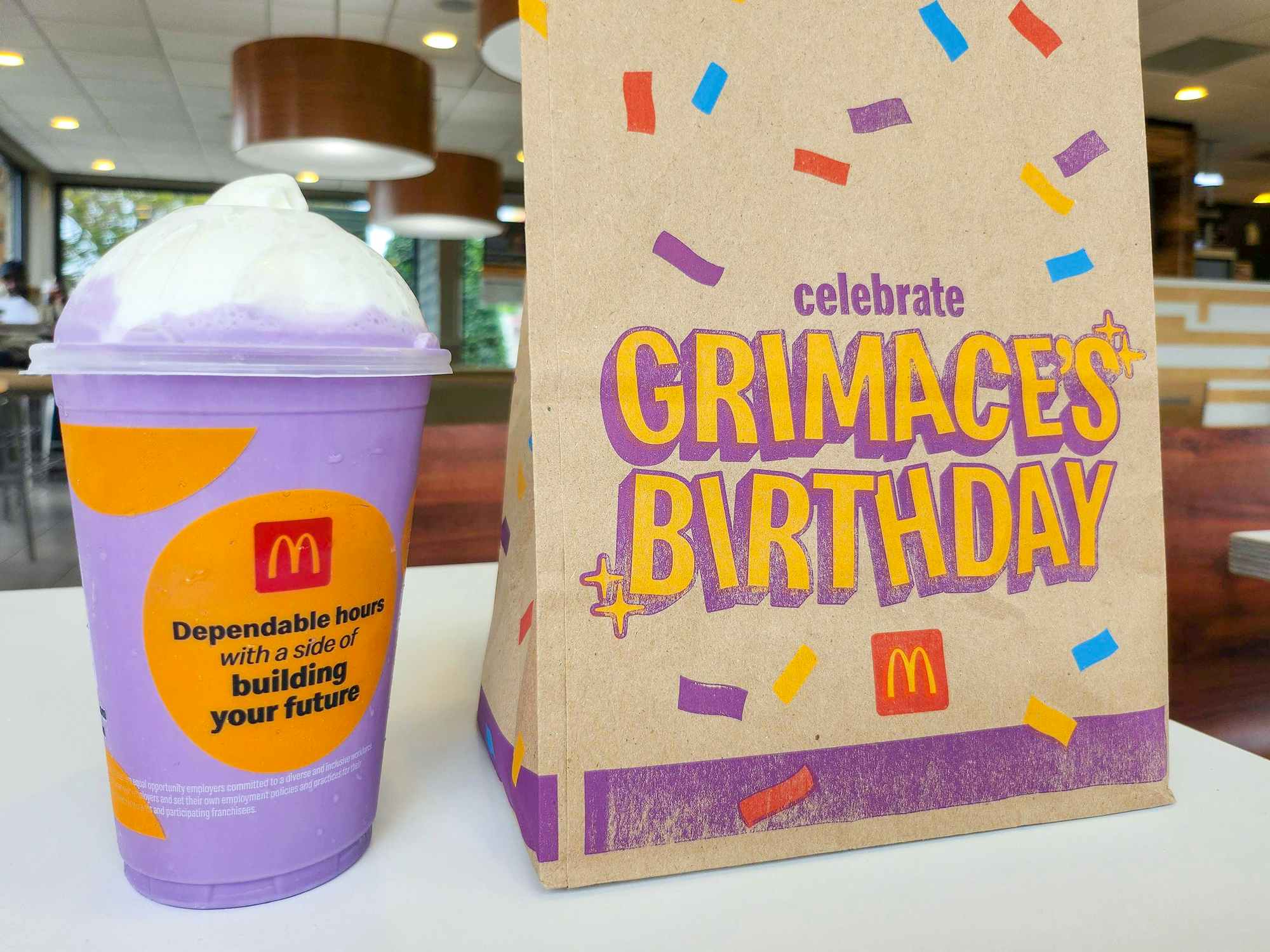 mcdonalds grimaces birthday meal bag and shake on table