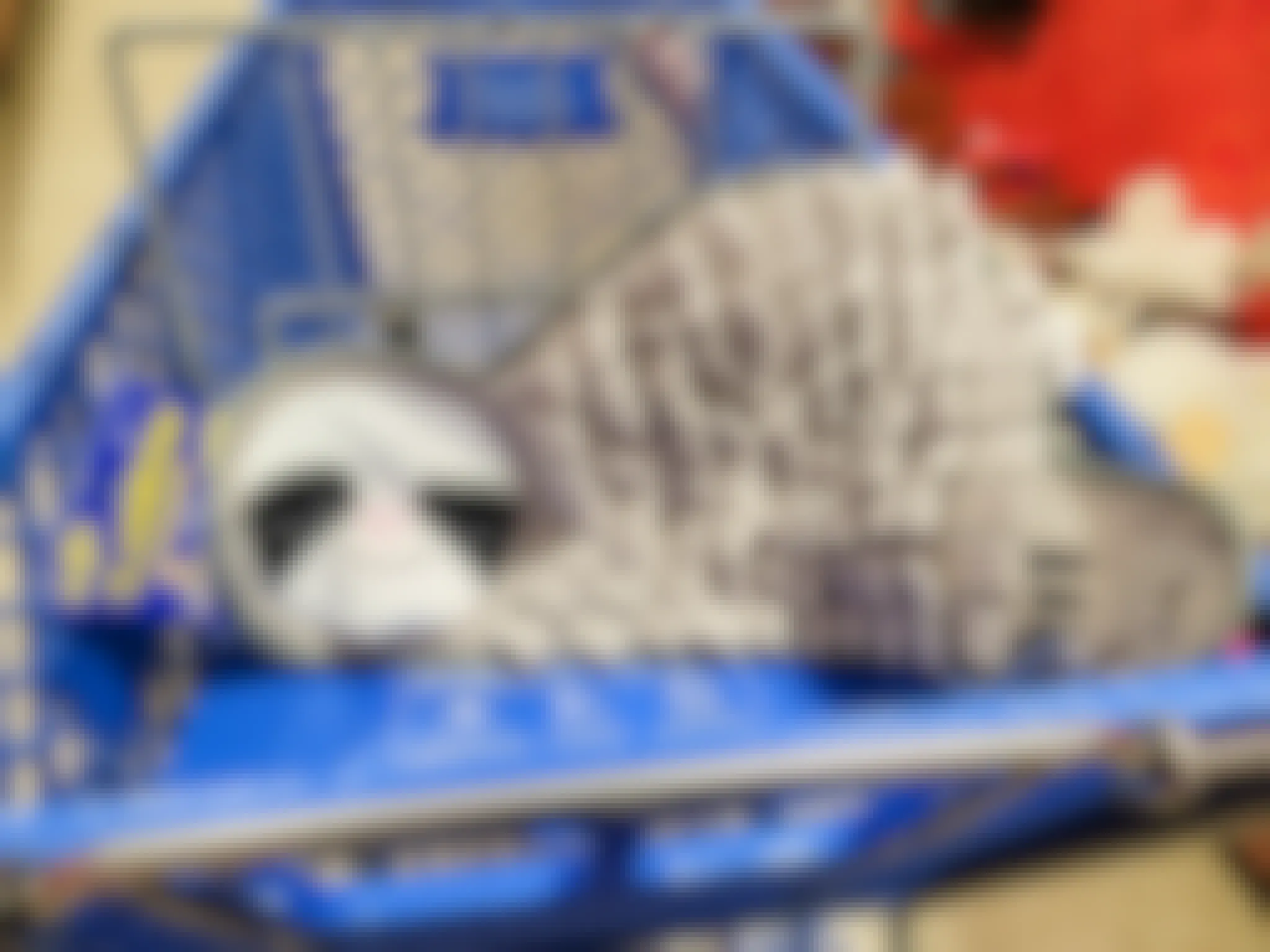 sloth snuffle mat in a cart