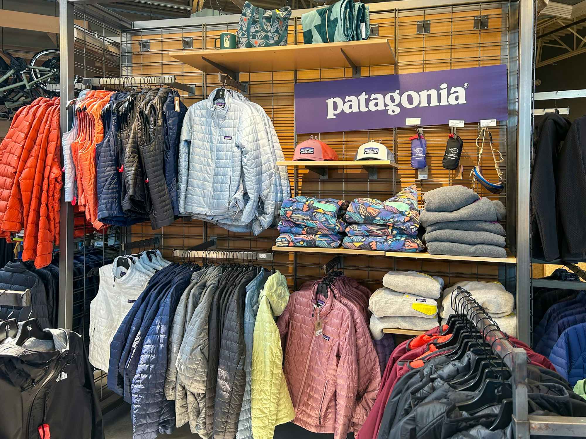 Sections of Patagonia clothing inside REI