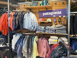 Sections of Patagonia clothing inside REI