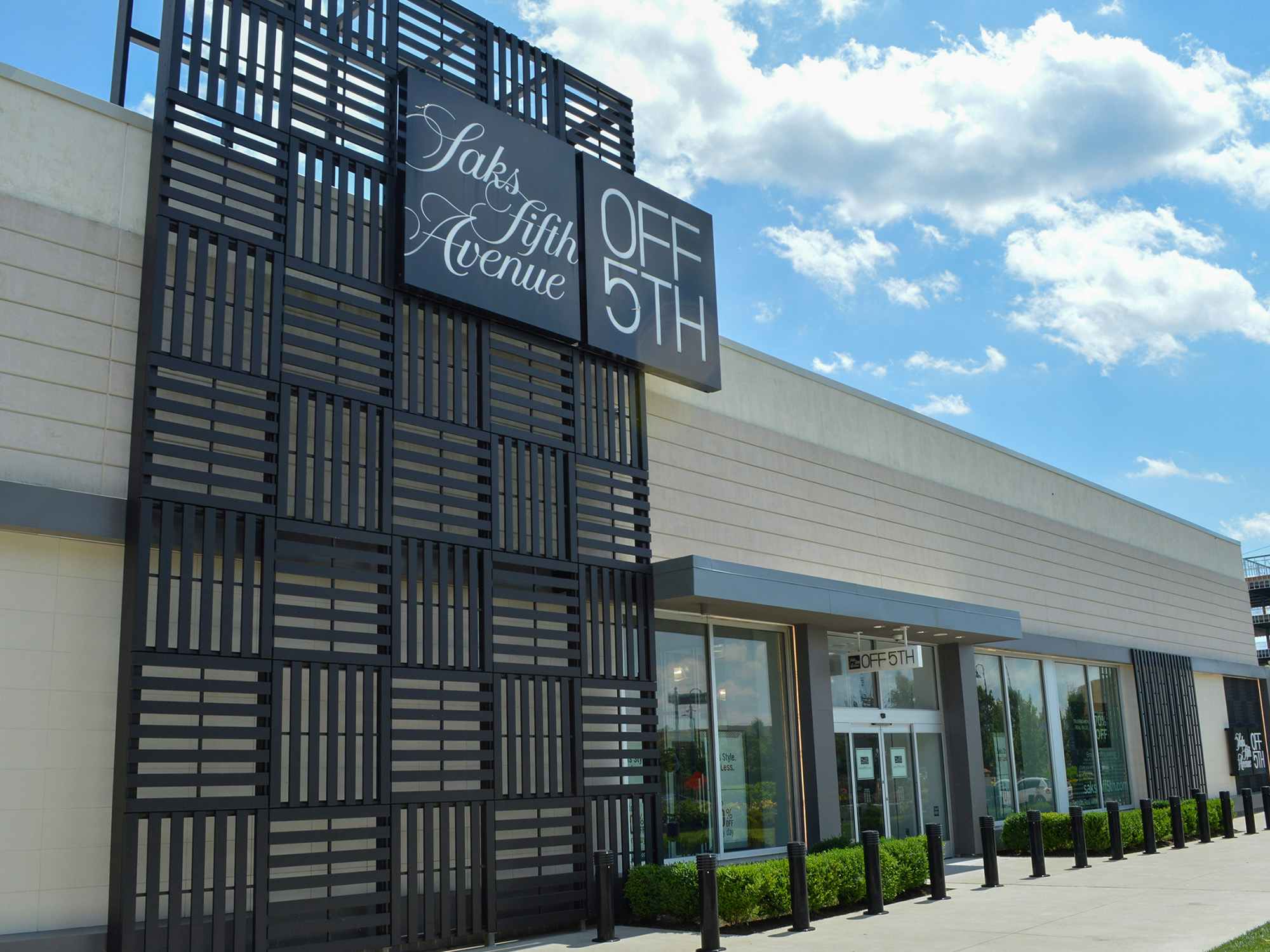 The exterior and sign of a Saks Fifth Avenue Off 5th store