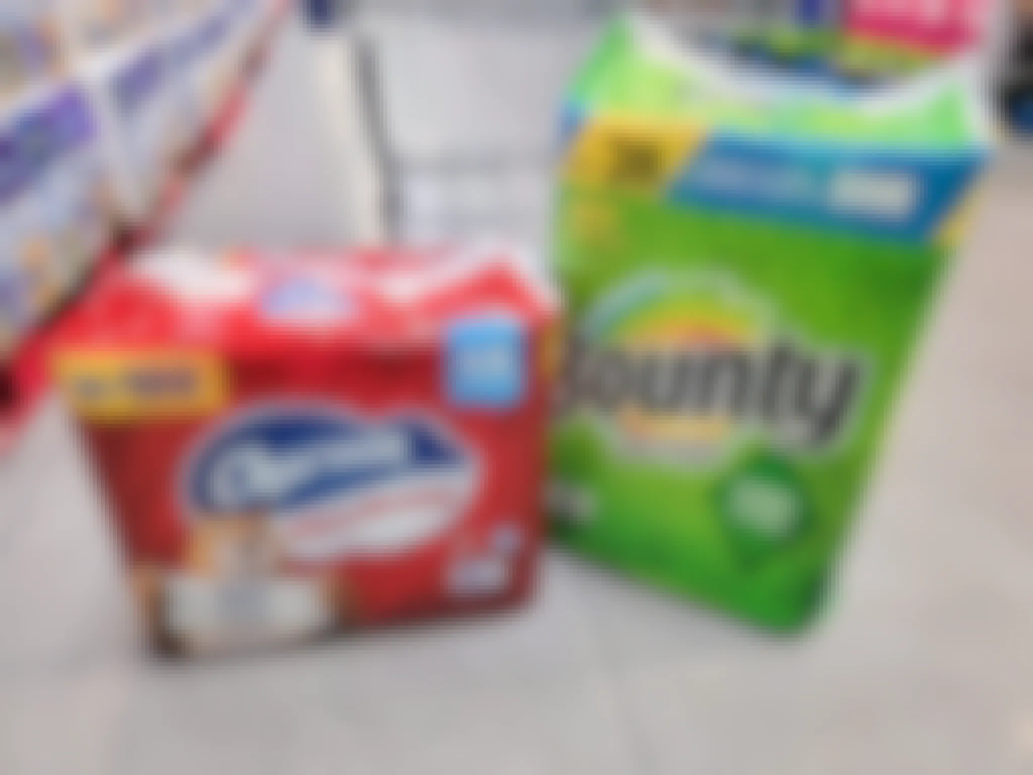 charmin bath tissue & bounty paper towels in front of a cart