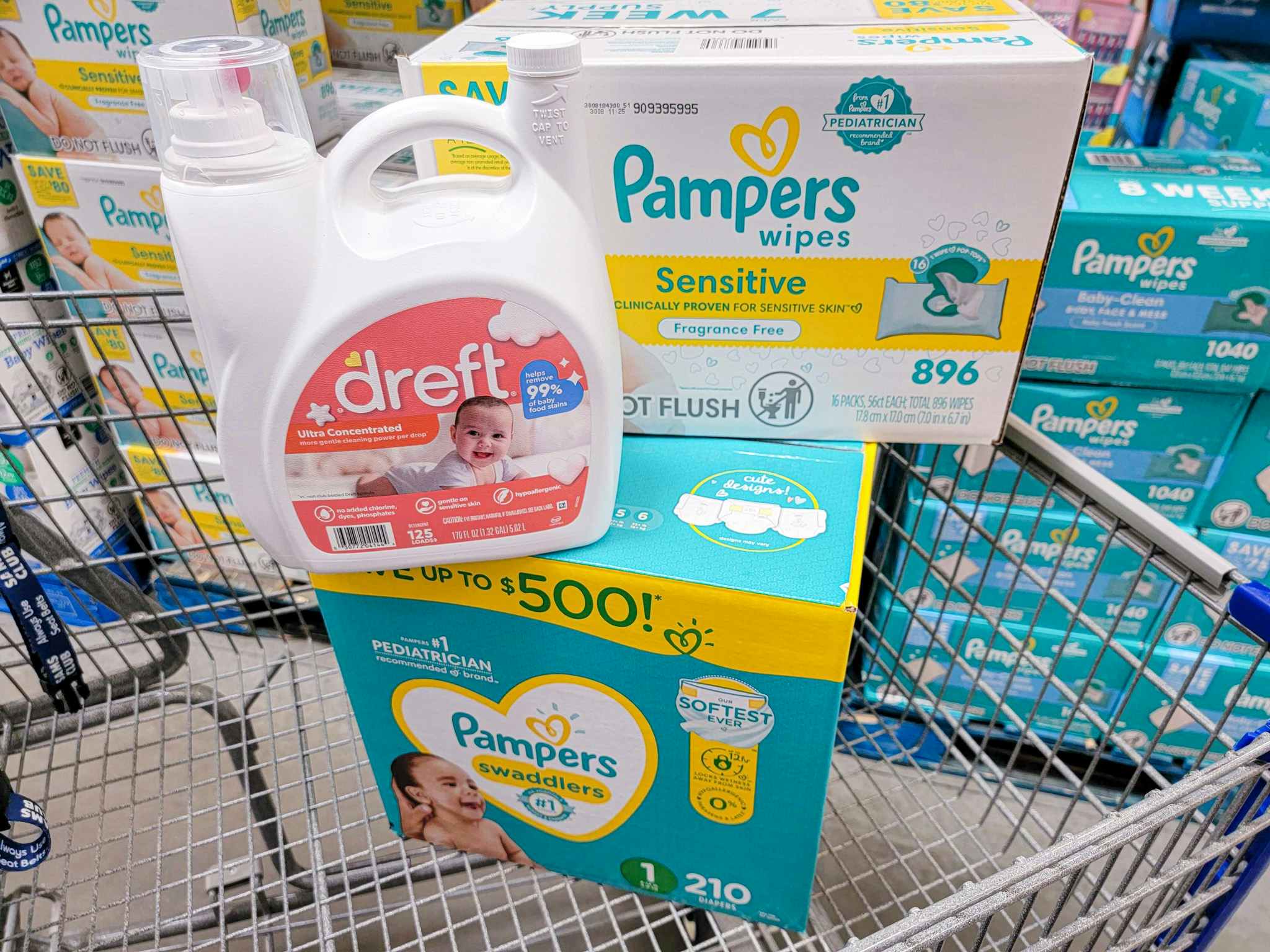 dreft detergent, pampers wipes and diapers in a cart