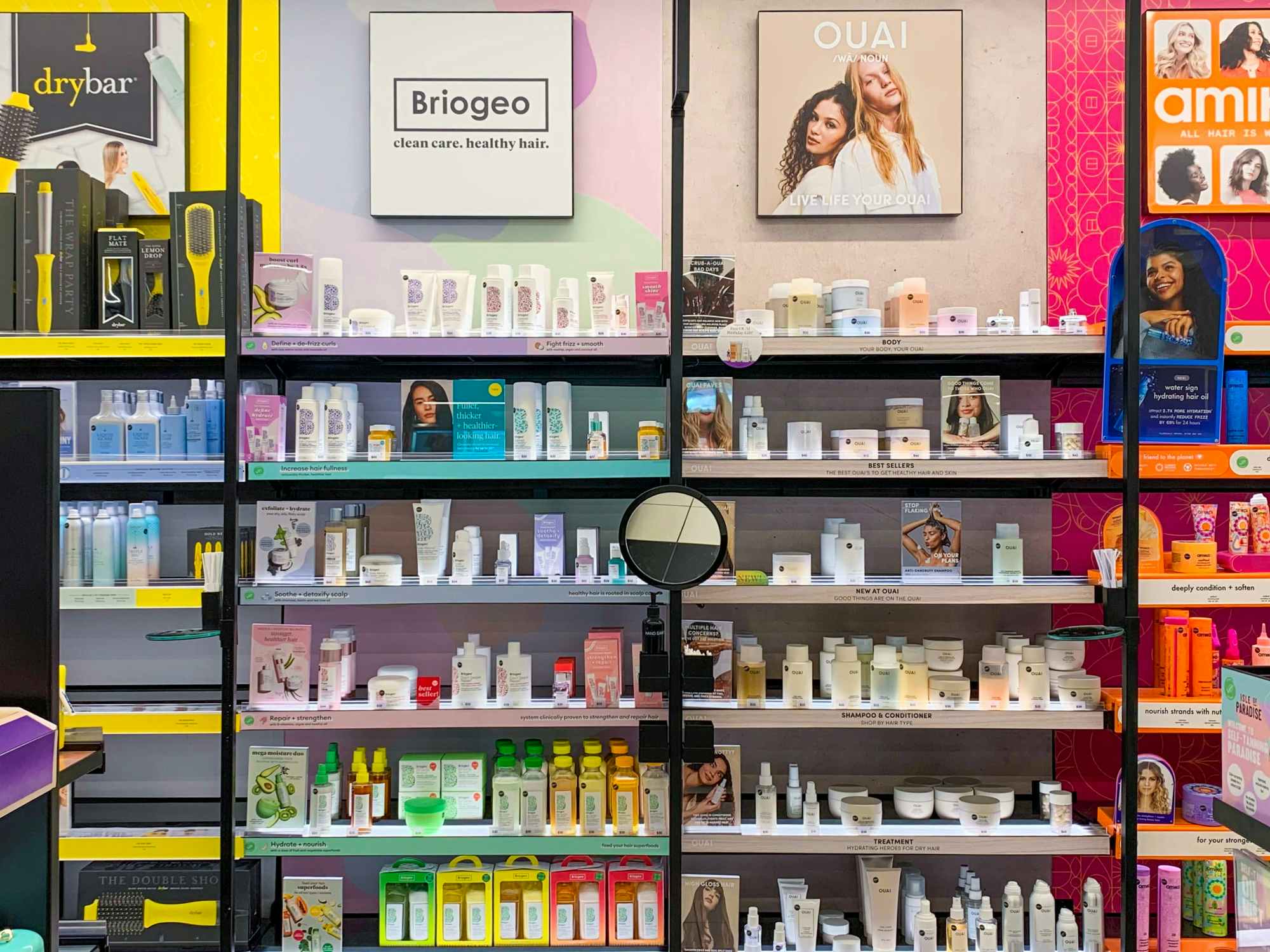 Haircare products on shelves at Sephora