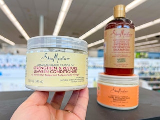 sheamoisture manuka honey shampoo, coconut hibiscus curl enhancing smoothie, and jamaican black castor oil leave-in conditioner