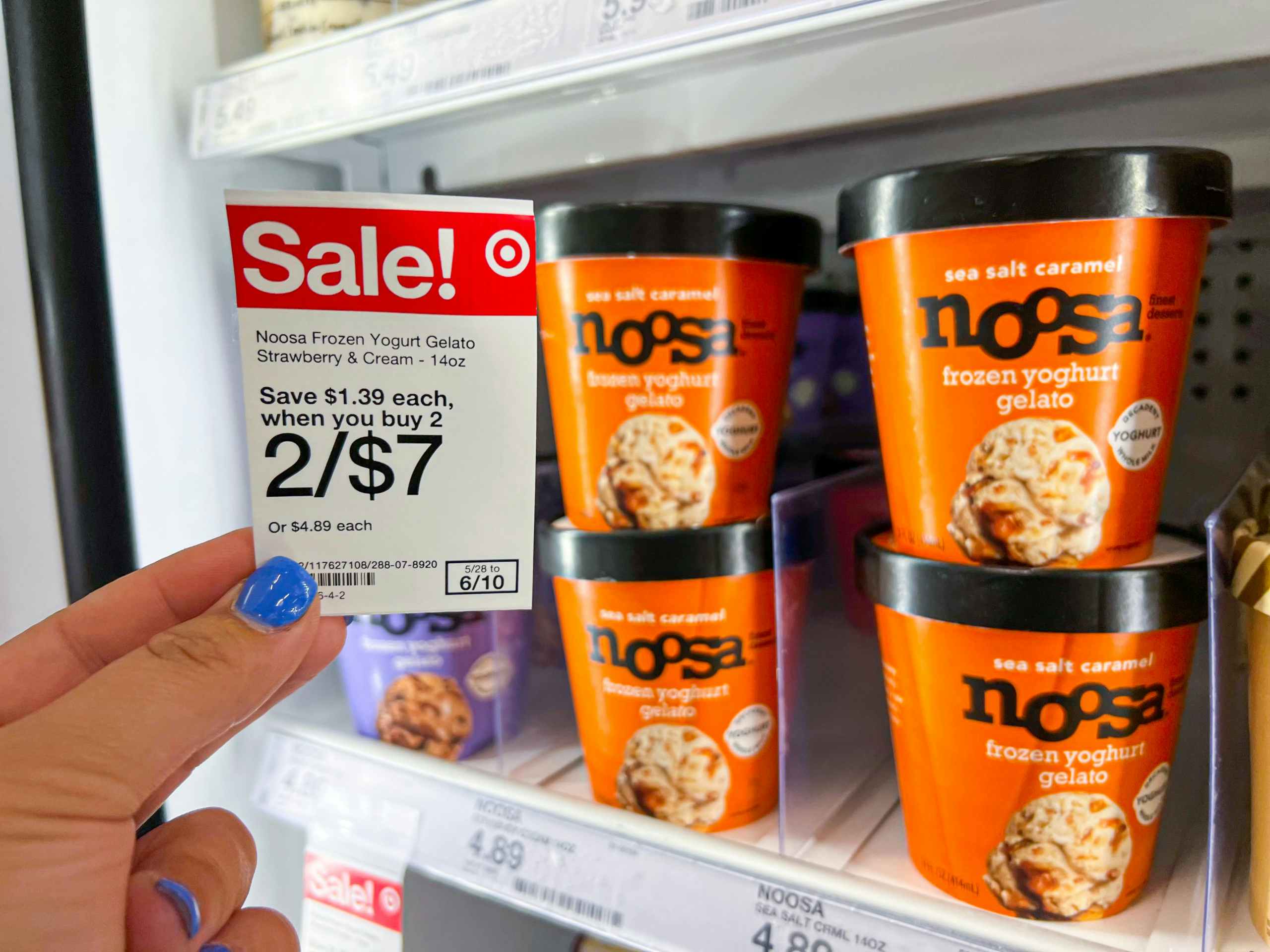 hand holding sales tag next to Noosa frozen gelato