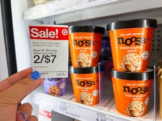 hand holding sales tag next to Noosa frozen gelato